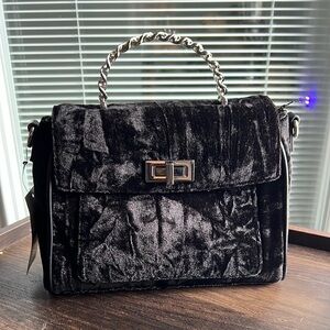 Sophisticated Black Shoulder Bag with Silver Accents